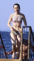 673x768, 66 KB, Lily_Collins_in_a_bikini_on_a_beach_in_Ischia_-01.jpg